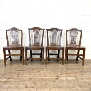 Four Similar Antique Welsh Oak Camel Back Chairs